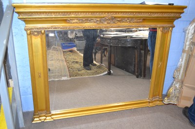 Lot 640 - A modern over mantel mirror in a gilt effect...