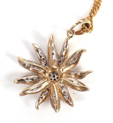 Lot 68 - A 9ct diamond star pendant on 9ct chain, the...