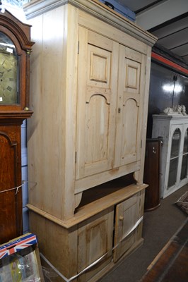 Lot 652 - A Victorian stripped pine four door cupboard,...