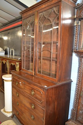 Lot 516 - A George III mahogany secretaire cabinet with...