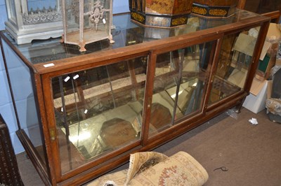 Lot 660 - An early 20th Century shop display cabinet...