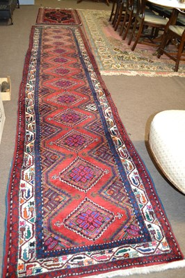 Lot 681 - A 20th Century Turkish wool runner carpet...