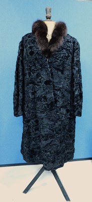 Lot 92 - A lady's black Astrakhan fur coat by Claude...