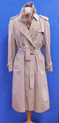 Lot 70 - A lady's Burberry double breasted trenchcoat,...