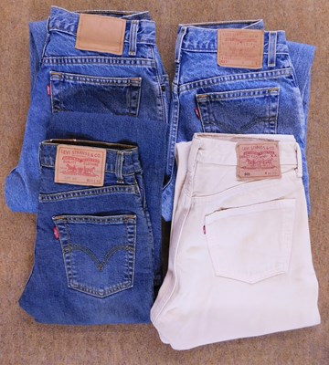 Lot 69 - Four pairs of lady's Levi jeans, to include...