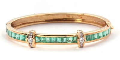 Lot 361 - An emerald and diamond bangle, the upper half...