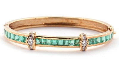 Lot 361 - An emerald and diamond bangle, the upper half...