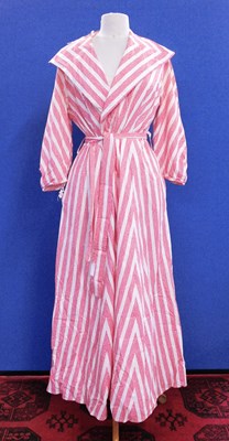Lot 61 - A mid 20th century cotton wrapover dress, the...