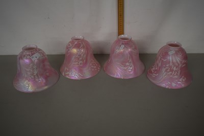 Lot 7 - A set of four 20th Century pink lustre finish...