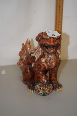 Lot 59 - Chinese pottery foo dog