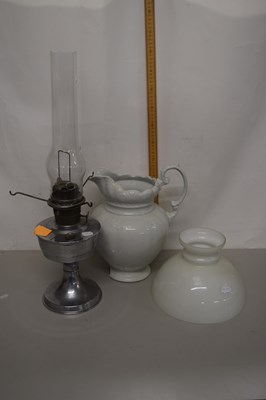 Lot 157 - Chrome based oil lamp together with a white...