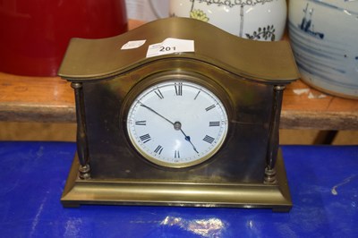 Lot 201 - A brass cased mantel clock