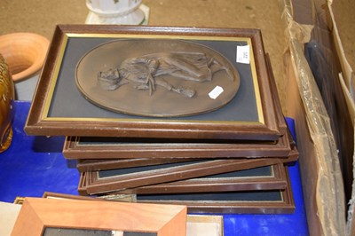 Lot 220 - A set of eight bronze effect framed wall plaques