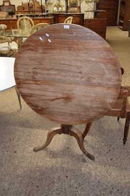 Lot 285 - A Georgian oak snap top supper table on turned...