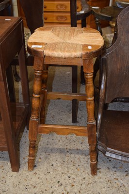 Lot 293 - A rush seated bar stool