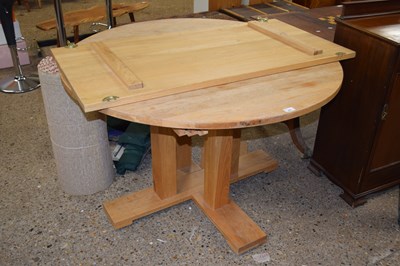 Lot 296 - Modern light oak pedestal extending dining table