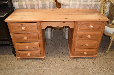 Lot 302 - A modern pine twin pedestal desk or dressing...