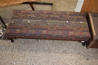 Lot 314 - A rectangular footstool with geometric upholstery