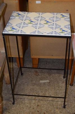 Lot 336 - A metal framed tile top table decorated with...