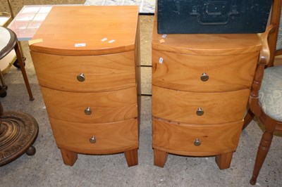 Lot 349 - A pair of pine bow front bedside cabinets