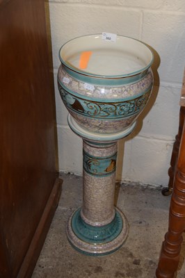 Lot 360 - A jardiniere and stand