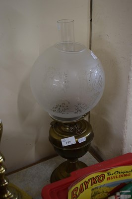 Lot 717 - Brass based oil lamp with frosted glass shade