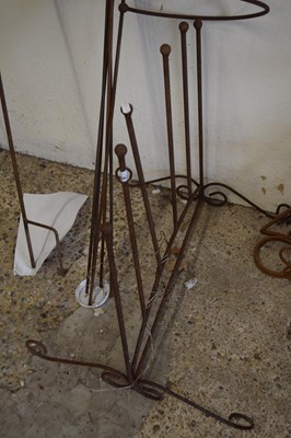 Lot 1042 - A wellie boot stand