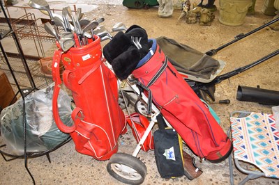 Lot 1058 - Two golf bags etc including clubs