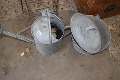 Lot 1065 - Galvanised watering can together with a...