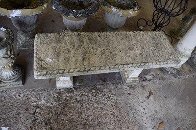 Lot 1095 - A composite garden bench