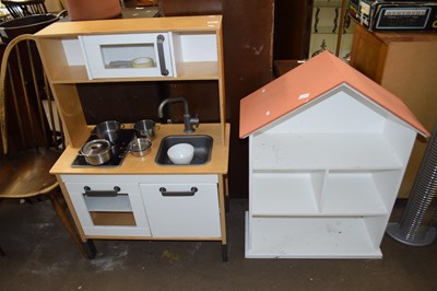 Lot 796 - A child's toy kitchen together with a house...