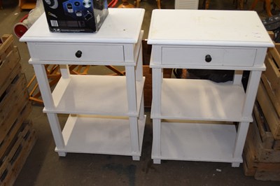 Lot 799 - A pair of three tier single drawer night stands