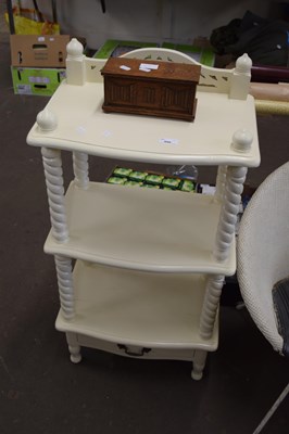 Lot 806 - Cream painted three tier shelf with barley...