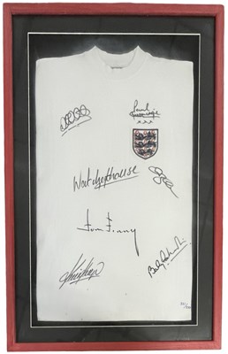 Lot 211 - A framed and glazed England football shirt,...