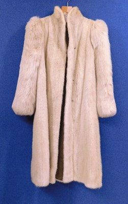 Lot 91 - A lady's full length cream fur coat by Hurtiq Ltd