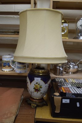 Lot 542 - METAL MOUNTED PORCELAIN TABLE LAMP WITH SHADE