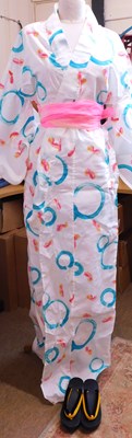Lot 51 - A modern cotton kimono, in white with printed...