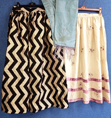 Lot 35 - Two skirts, one a custom made black and gold...
