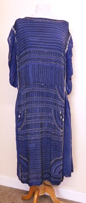Lot 10 - An Edwardian beaded dress, the blue chiffon...