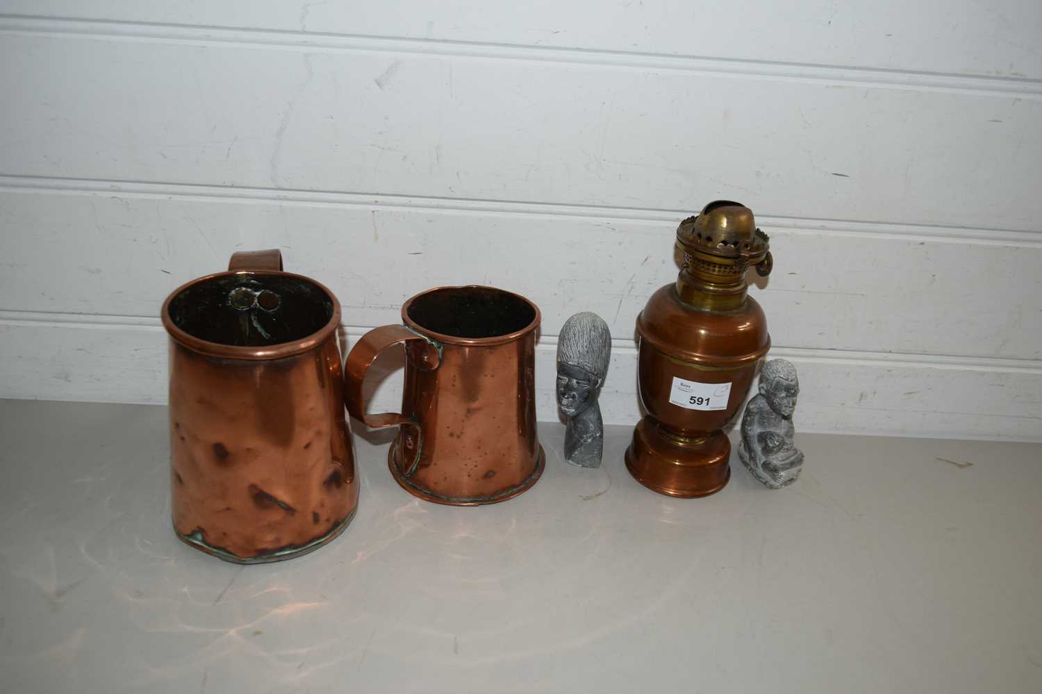 Lot 591 TWO COPPER TANKARDS AND A COPPER OIL LAMP