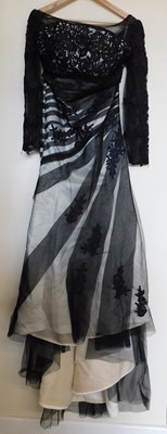 Lot 51 - A black and cream gown by Dylan Queen, the...