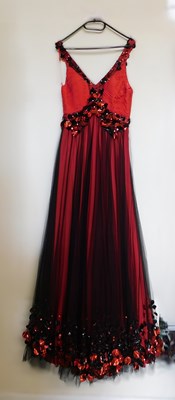 Lot 50 - A red and black gown, the red silk with black...