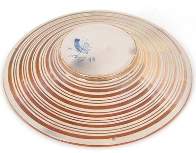 Lot 47 - A Cantagalli lustre dish decorated in...