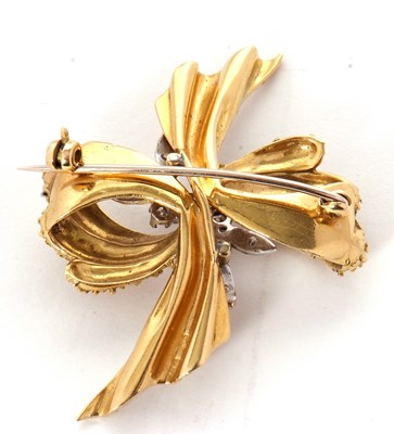Lot 53 - An 18ct diamond brooch, the textured knot...