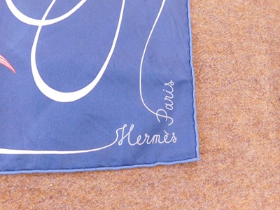 Lot 117 - An Hermes 'Faune Lettre' silk scarf designed...