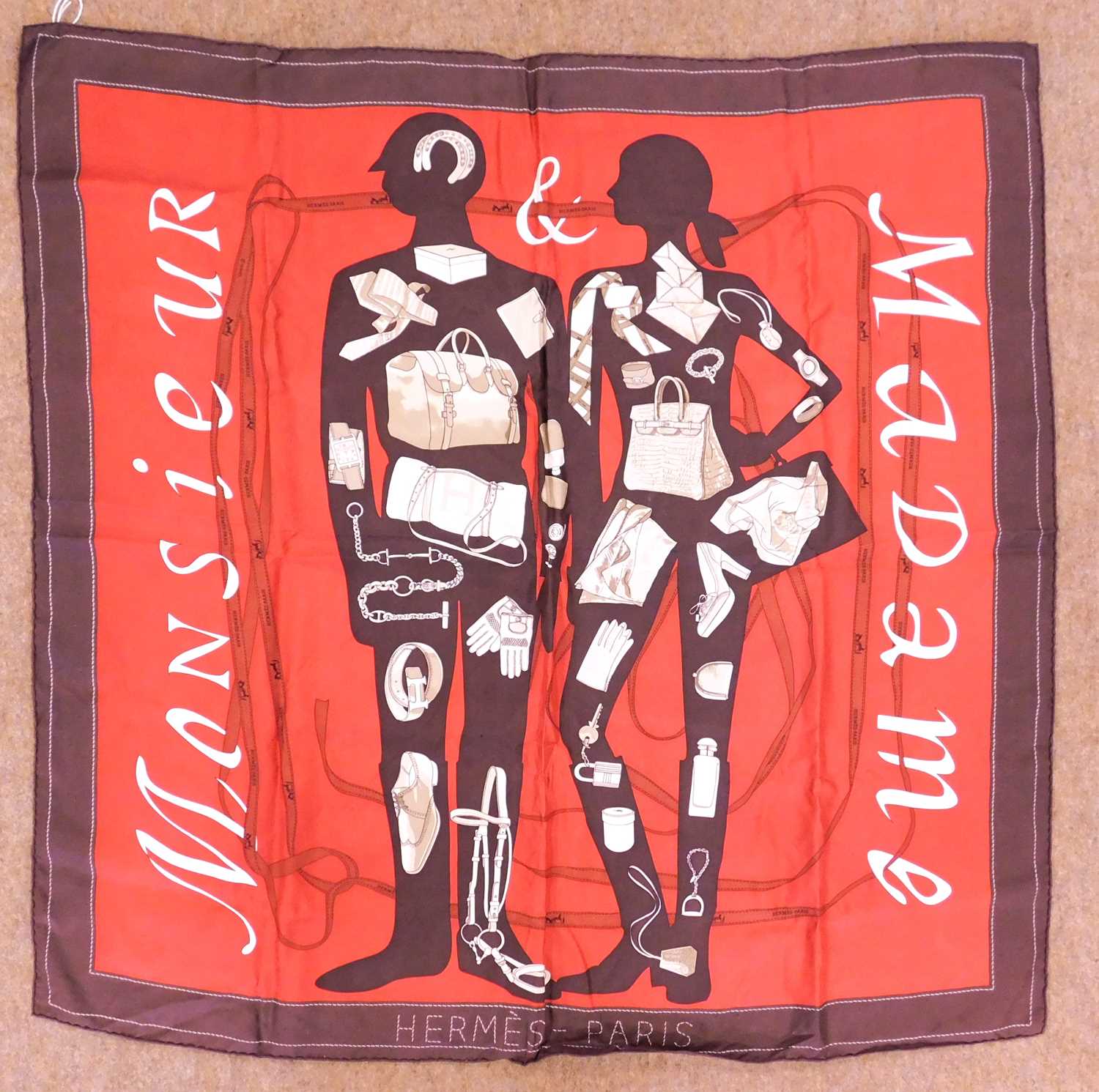 Lot 118 - An Hermes 'Madame Monsieur' silk scarf, approx....