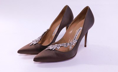 Lot 145 - A pair of Manolo Blahnik beige satin and...