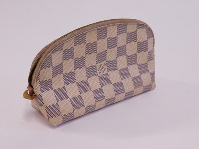 Lot 130 - A Louis Vuitton purse, half moon shape with...