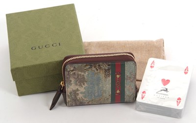 Lot 158 - A set of unopened Gucci playing cards, the...