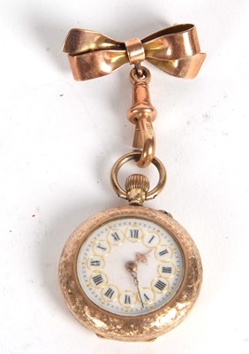 Lot 222 - A yellow metal fob watch with 9ct bow pin, the...